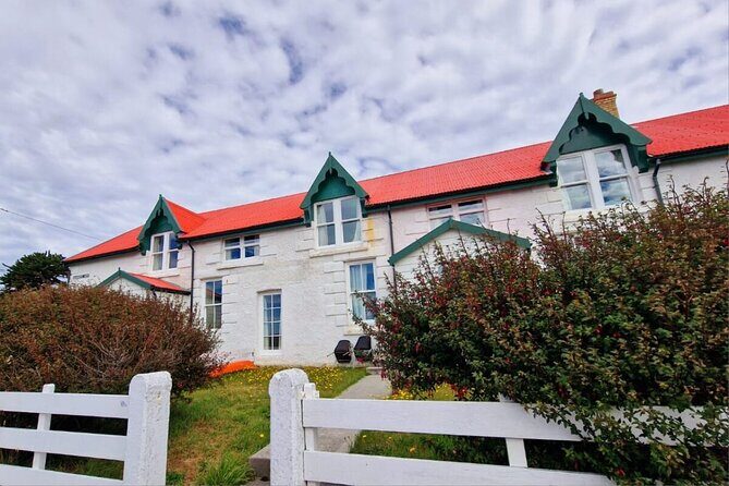Falkland Islands Shared Tour Sightseeing with Penguins - FIGAS, Government House, and the centenary monument: town stops with meaning