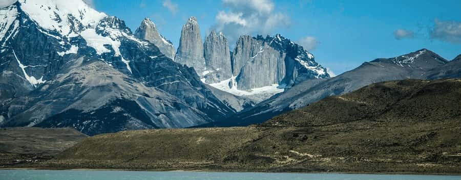 From Puerto Natales: Torres del Paine National Park Day Tour - Getting going from Puerto Natales: early pickup, shared transport