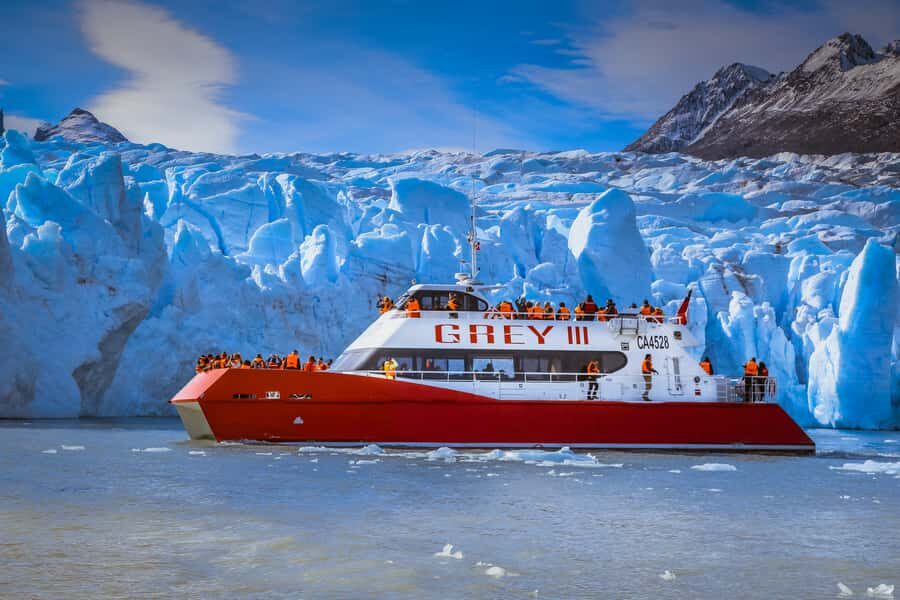Torres del Paine: 3-Hour Scenic Boat Tour to Grey Glacier - Arriving at Hotel Lago Grey and Facing the Beach Walk