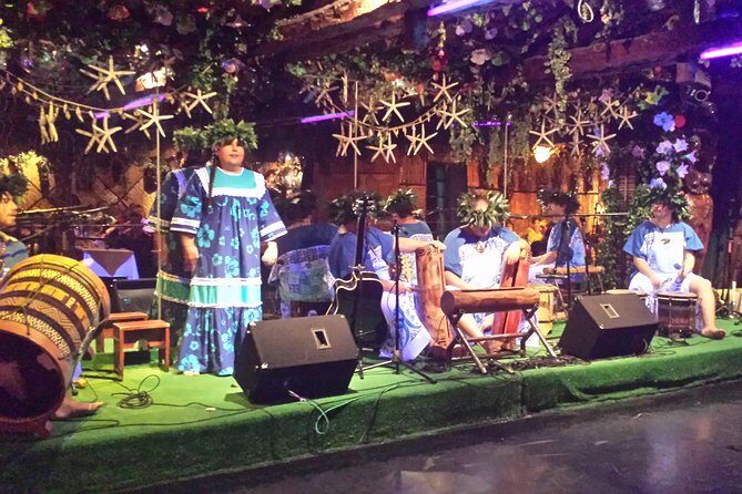 Traditional Dinner Show in Santiago - Moai-inspired staging: Easter Island influence in wood and light